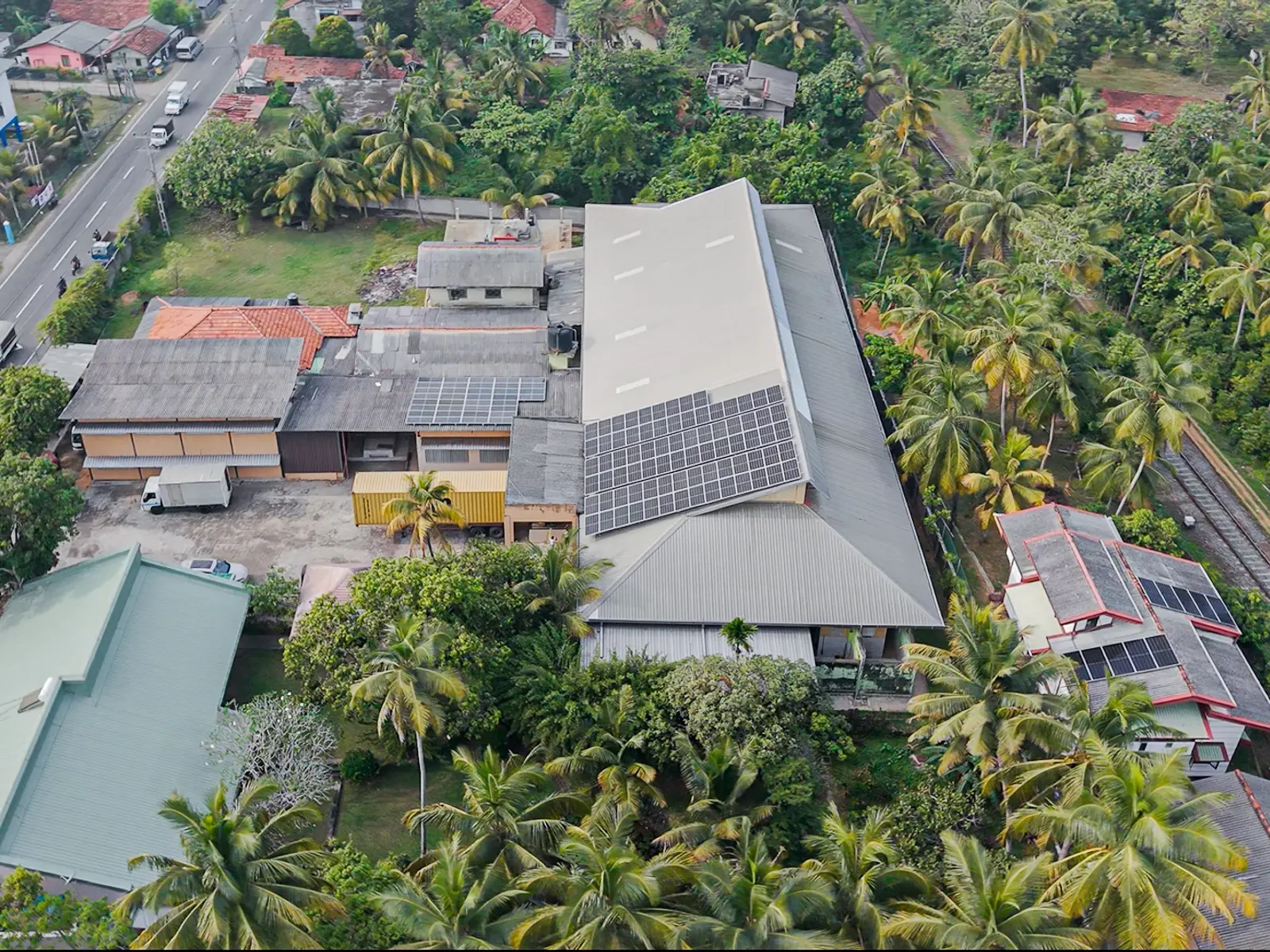 Aerial view of the second SDS warehouse in Kosgoda with solar panels across its roof