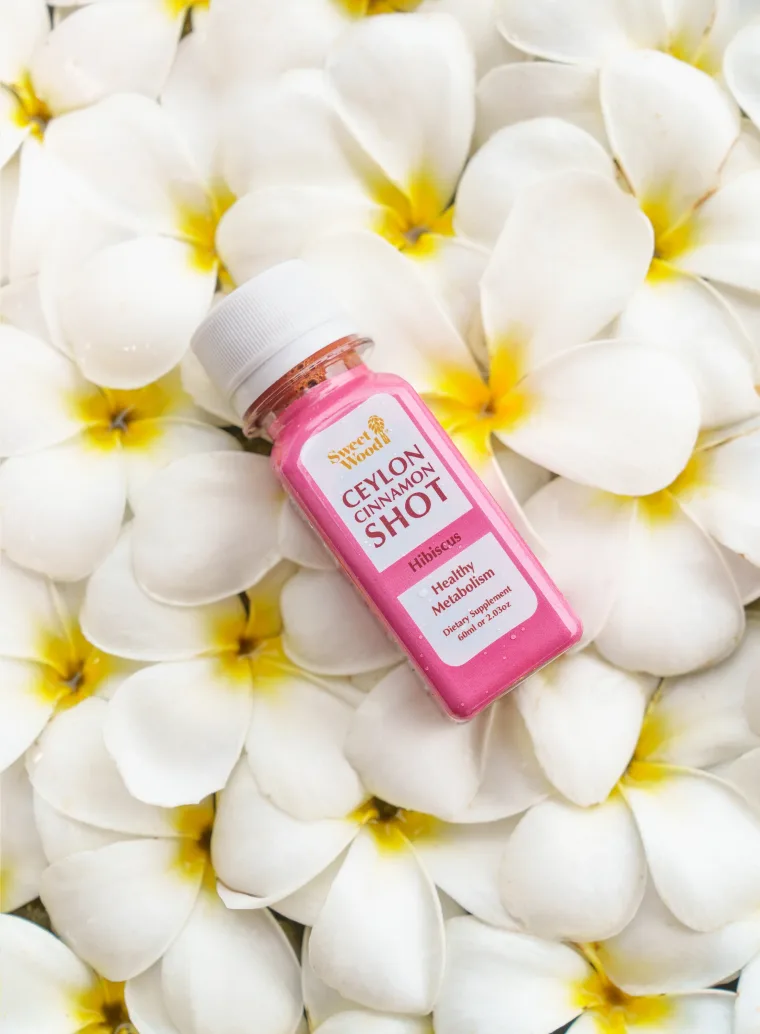 Sweet Wood Ceylon Cinnamon and Hibiscus Shot bottle with a plain white cap