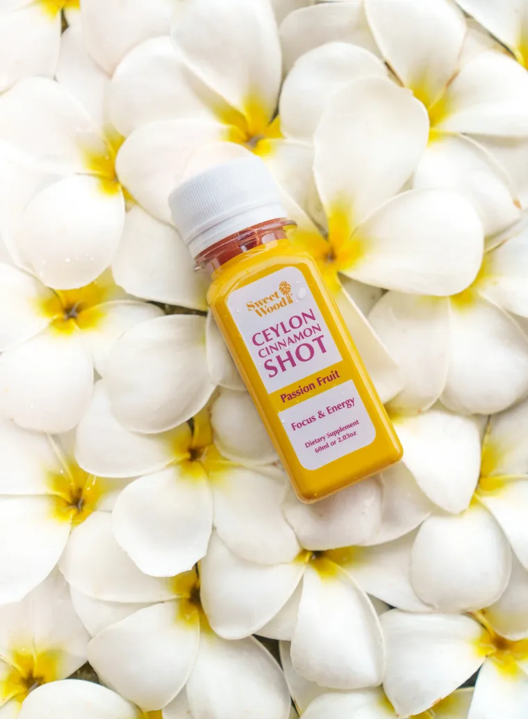 Sweet Wood Ceylon Cinnamon and Passion Fruit Shot bottle with a plain white cap